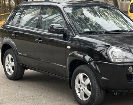 Черный Хендай Туксон, объемом двигателя 2 л и пробегом 280 тыс. км за 3250 $, фото 1 на Automoto.ua