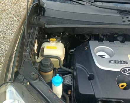 Черный Хендай Туксон, объемом двигателя 2 л и пробегом 236 тыс. км за 6000 $, фото 19 на Automoto.ua