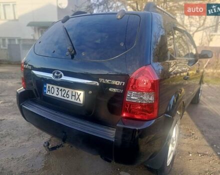 Черный Хендай Туксон, объемом двигателя 1.99 л и пробегом 302 тыс. км за 6300 $, фото 8 на Automoto.ua