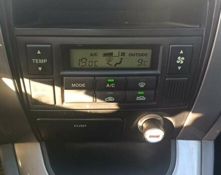 Черный Хендай Туксон, объемом двигателя 2 л и пробегом 236 тыс. км за 6000 $, фото 26 на Automoto.ua