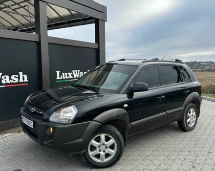 Черный Хендай Туксон, объемом двигателя 2 л и пробегом 180 тыс. км за 6450 $, фото 8 на Automoto.ua