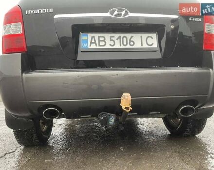 Черный Хендай Туксон, объемом двигателя 1.99 л и пробегом 204 тыс. км за 6100 $, фото 27 на Automoto.ua