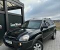 Черный Хендай Туксон, объемом двигателя 2 л и пробегом 180 тыс. км за 6450 $, фото 3 на Automoto.ua