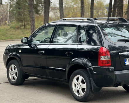 Черный Хендай Туксон, объемом двигателя 2 л и пробегом 280 тыс. км за 3250 $, фото 4 на Automoto.ua