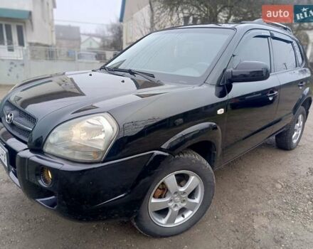 Черный Хендай Туксон, объемом двигателя 1.99 л и пробегом 302 тыс. км за 6300 $, фото 14 на Automoto.ua