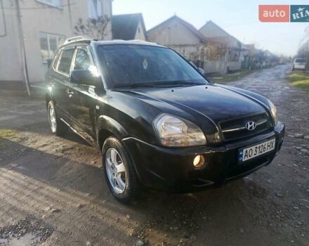 Черный Хендай Туксон, объемом двигателя 1.99 л и пробегом 302 тыс. км за 6300 $, фото 1 на Automoto.ua