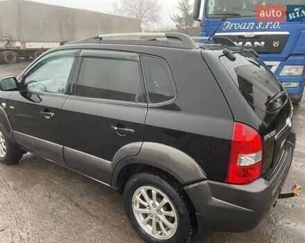 Черный Хендай Туксон, объемом двигателя 1.99 л и пробегом 204 тыс. км за 6100 $, фото 19 на Automoto.ua