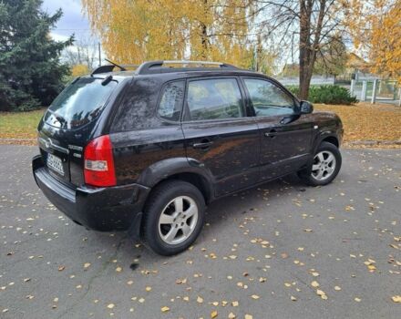 Черный Хендай Туксон, объемом двигателя 2 л и пробегом 280 тыс. км за 3250 $, фото 2 на Automoto.ua