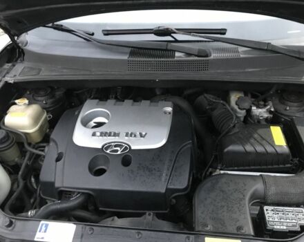 Чорний Хендай Туксон, об'ємом двигуна 2 л та пробігом 270 тис. км за 5850 $, фото 6 на Automoto.ua