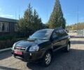 Черный Хендай Туксон, объемом двигателя 1.98 л и пробегом 190 тыс. км за 6450 $, фото 1 на Automoto.ua