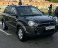 Черный Хендай Туксон, объемом двигателя 2 л и пробегом 200 тыс. км за 6700 $, фото 1 на Automoto.ua
