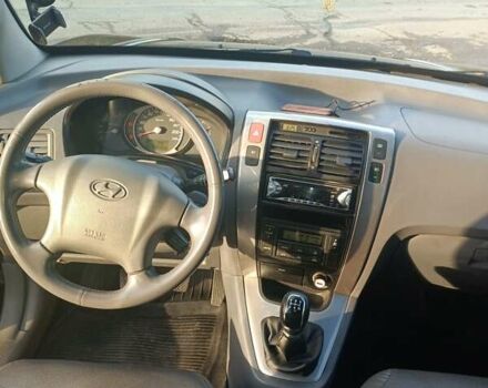 Черный Хендай Туксон, объемом двигателя 2 л и пробегом 236 тыс. км за 6000 $, фото 20 на Automoto.ua