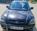 Чорний Хендай Туксон, об'ємом двигуна 2 л та пробігом 235 тис. км за 5500 $, фото 1 на Automoto.ua