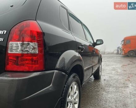 Черный Хендай Туксон, объемом двигателя 1.99 л и пробегом 204 тыс. км за 6100 $, фото 25 на Automoto.ua