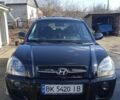 Чорний Хендай Туксон, об'ємом двигуна 2 л та пробігом 155 тис. км за 6850 $, фото 1 на Automoto.ua