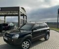 Черный Хендай Туксон, объемом двигателя 2 л и пробегом 180 тыс. км за 6450 $, фото 15 на Automoto.ua