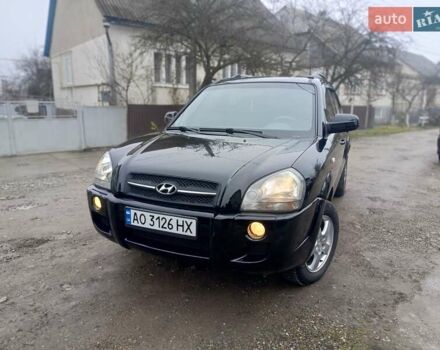 Черный Хендай Туксон, объемом двигателя 1.99 л и пробегом 302 тыс. км за 6300 $, фото 20 на Automoto.ua