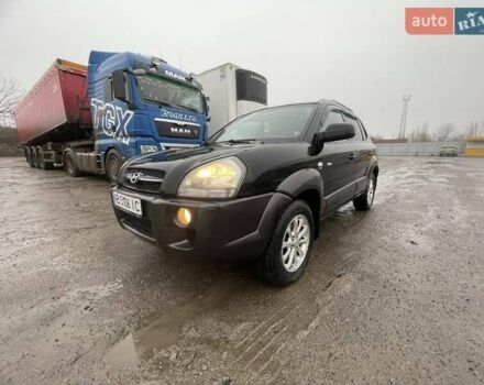 Черный Хендай Туксон, объемом двигателя 1.99 л и пробегом 204 тыс. км за 6100 $, фото 9 на Automoto.ua