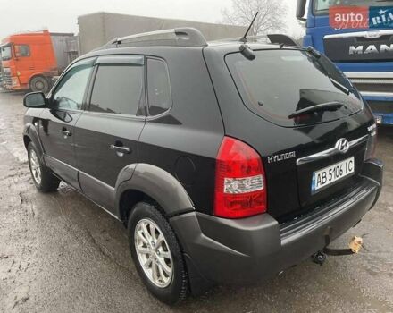 Черный Хендай Туксон, объемом двигателя 1.99 л и пробегом 204 тыс. км за 6100 $, фото 11 на Automoto.ua