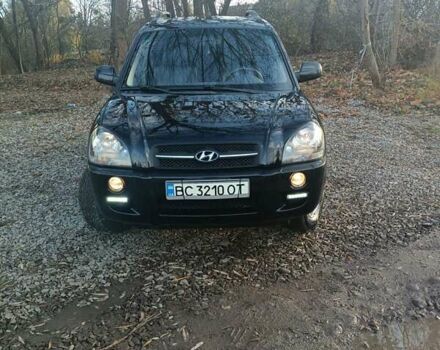 Черный Хендай Туксон, объемом двигателя 2 л и пробегом 236 тыс. км за 6000 $, фото 4 на Automoto.ua