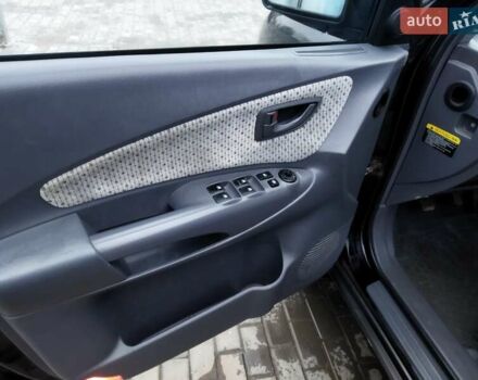 Черный Хендай Туксон, объемом двигателя 1.99 л и пробегом 204 тыс. км за 6100 $, фото 36 на Automoto.ua