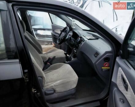 Черный Хендай Туксон, объемом двигателя 1.99 л и пробегом 204 тыс. км за 6100 $, фото 37 на Automoto.ua