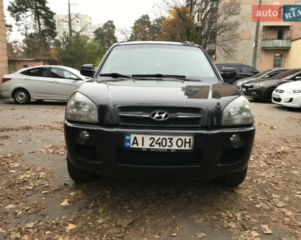 Черный Хендай Туксон, объемом двигателя 2 л и пробегом 261 тыс. км за 6500 $, фото 2 на Automoto.ua