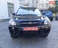 Черный Хендай Туксон, объемом двигателя 1.98 л и пробегом 203 тыс. км за 7700 $, фото 6 на Automoto.ua