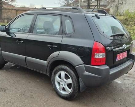 Черный Хендай Туксон, объемом двигателя 1.98 л и пробегом 230 тыс. км за 6390 $, фото 29 на Automoto.ua