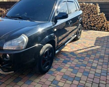 Черный Хендай Туксон, объемом двигателя 2 л и пробегом 315 тыс. км за 7000 $, фото 14 на Automoto.ua