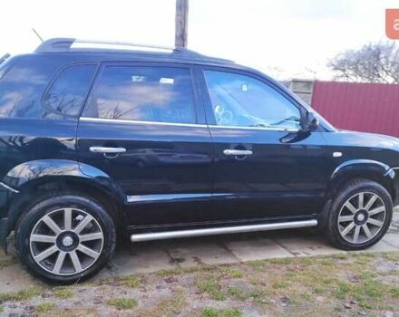 Черный Хендай Туксон, объемом двигателя 2 л и пробегом 208 тыс. км за 6950 $, фото 55 на Automoto.ua