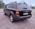Чорний Хендай Туксон, об'ємом двигуна 1.98 л та пробігом 262 тис. км за 6850 $, фото 4 на Automoto.ua