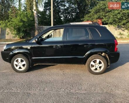 Черный Хендай Туксон, объемом двигателя 2 л и пробегом 253 тыс. км за 7500 $, фото 6 на Automoto.ua