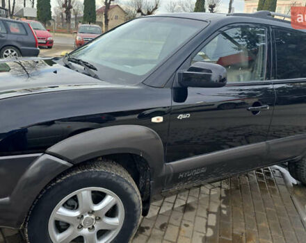 Черный Хендай Туксон, объемом двигателя 2 л и пробегом 217 тыс. км за 7552 $, фото 4 на Automoto.ua