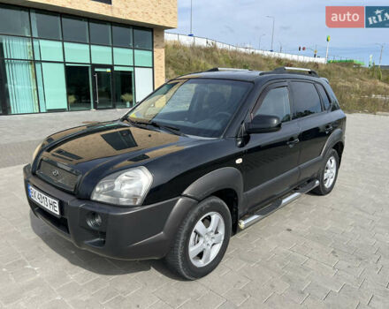 Черный Хендай Туксон, объемом двигателя 2 л и пробегом 255 тыс. км за 6900 $, фото 1 на Automoto.ua