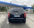 Черный Хендай Туксон, объемом двигателя 2 л и пробегом 230 тыс. км за 7500 $, фото 3 на Automoto.ua