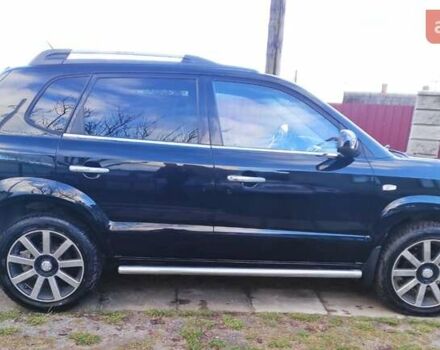 Черный Хендай Туксон, объемом двигателя 2 л и пробегом 208 тыс. км за 6950 $, фото 7 на Automoto.ua