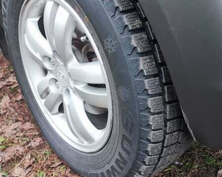 Черный Хендай Туксон, объемом двигателя 2 л и пробегом 284 тыс. км за 4700 $, фото 3 на Automoto.ua