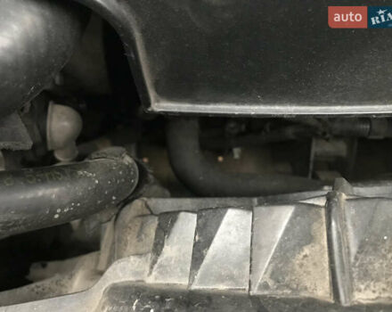 Черный Хендай Туксон, объемом двигателя 2 л и пробегом 261 тыс. км за 6500 $, фото 17 на Automoto.ua