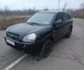 Черный Хендай Туксон, объемом двигателя 2 л и пробегом 293 тыс. км за 4300 $, фото 1 на Automoto.ua