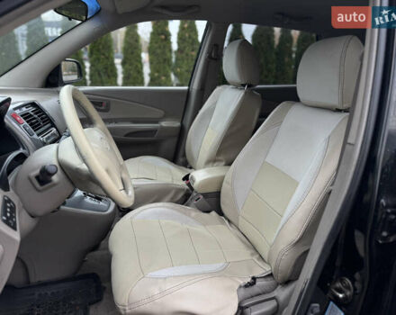 Черный Хендай Туксон, объемом двигателя 2.7 л и пробегом 220 тыс. км за 6950 $, фото 6 на Automoto.ua