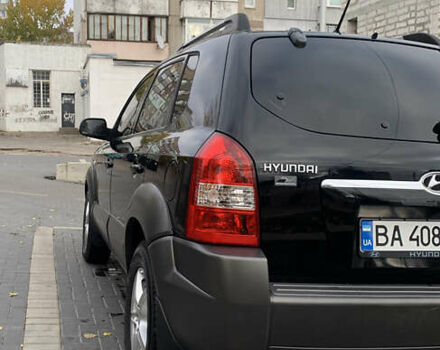 Черный Хендай Туксон, объемом двигателя 2 л и пробегом 219 тыс. км за 8400 $, фото 4 на Automoto.ua