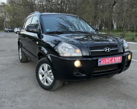 Черный Хендай Туксон, объемом двигателя 2 л и пробегом 137 тыс. км за 7499 $, фото 1 на Automoto.ua