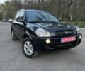 Черный Хендай Туксон, объемом двигателя 2 л и пробегом 137 тыс. км за 7499 $, фото 1 на Automoto.ua