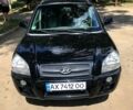 Хендай Туксон 2005 в Первомайском на Automoto.ua Черный Хендай Туксон, объемом двигателя 2 л и пробегом 253 тыс. км за 7700 $, фото 3 на Automoto.ua