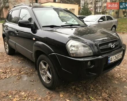 Черный Хендай Туксон, объемом двигателя 2 л и пробегом 261 тыс. км за 6500 $, фото 19 на Automoto.ua