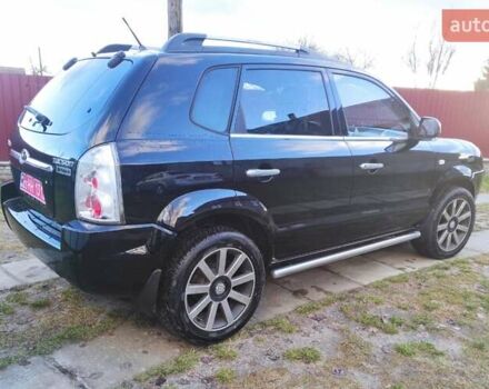 Черный Хендай Туксон, объемом двигателя 2 л и пробегом 208 тыс. км за 6950 $, фото 9 на Automoto.ua