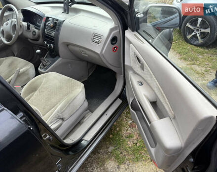 Черный Хендай Туксон, объемом двигателя 2 л и пробегом 211 тыс. км за 4444 $, фото 13 на Automoto.ua