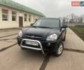 Черный Хендай Туксон, объемом двигателя 2 л и пробегом 190 тыс. км за 7500 $, фото 1 на Automoto.ua