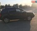 Черный Хендай Туксон, объемом двигателя 2 л и пробегом 253 тыс. км за 7500 $, фото 7 на Automoto.ua